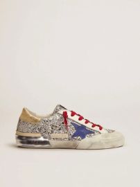 Super Star Sneakers in silver glitter and multi foxing by Golden Goose at THE YES